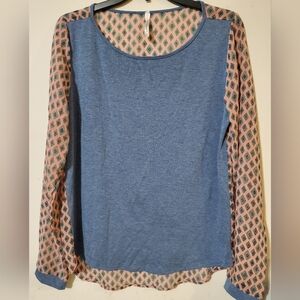 Anthropologie Blue Scoop Neck Sheer Back Top with Pink Geo Patterned Sleeves